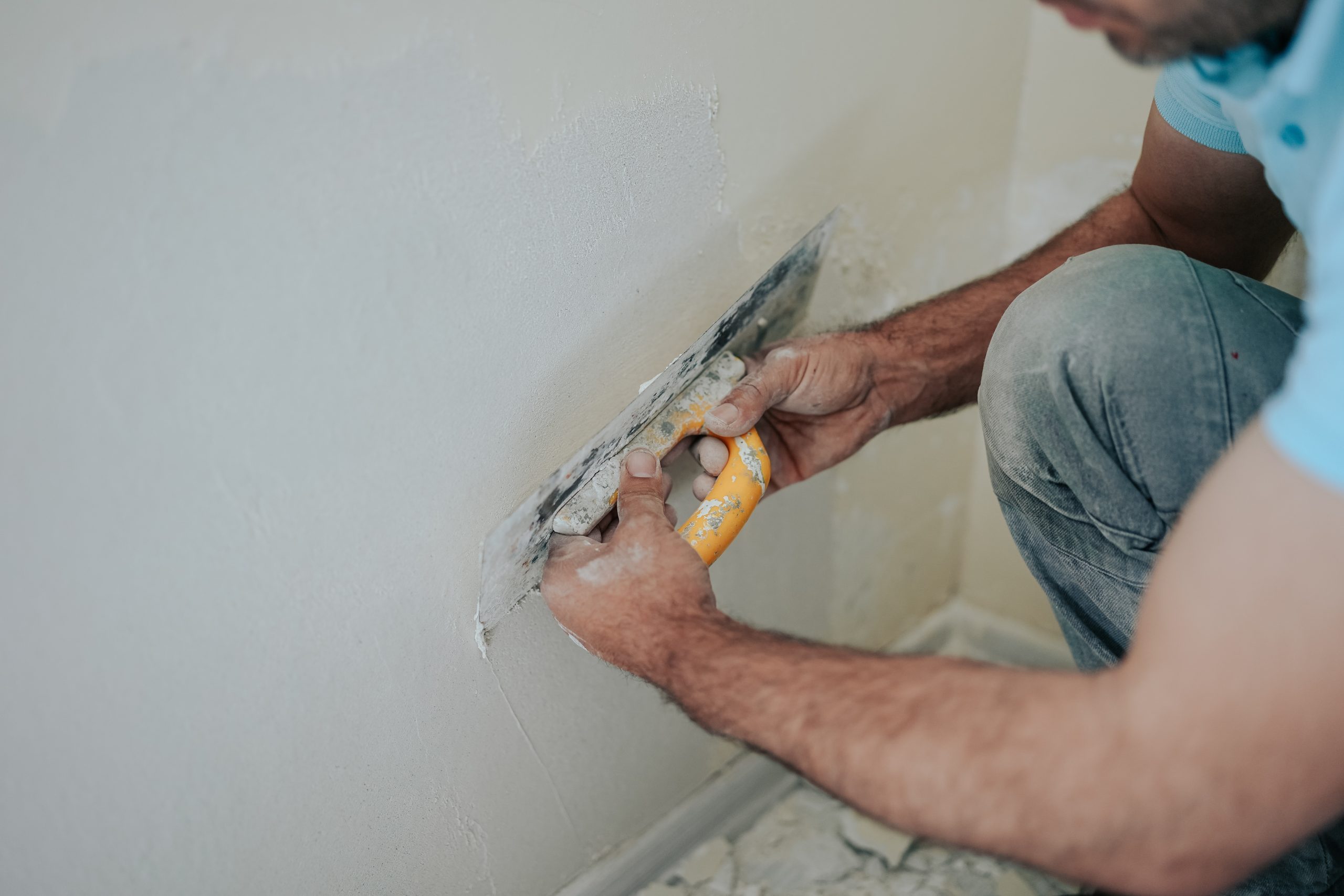 plastering the wall